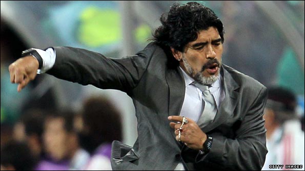Diego Maradona cannot keep still on the touchline 