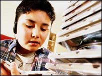 Boy listens to music