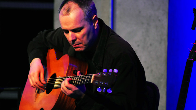 Mick West's band live at Pacific Quay. Photo by Sean Purser.