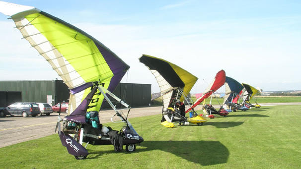 A beauty parade of microlights.
