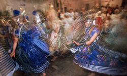 Ogum charges towards the drums where he will show his mythical dances.