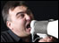 Man shouting into megaphone