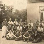 Photograph from the back page of one of the diaries. Our working party taken at Zwittau, East Sudetenland 1942. Place of employment is a timber mill. See also Photograph No. 011.