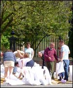Volunteers fill sand bags in Tewkesbury