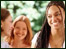 Three friends smiling