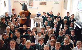 Children at Broad Town school near Wootton Bassett receive their award for recycling fifty tonnes of rubbish.