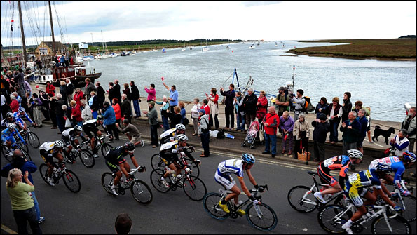 The peleton passes through Wells-next-the-Sea during stage six of the Tour of Britain 