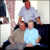 Joseph Judson standing with Carole Scragg and brother Barry Davis