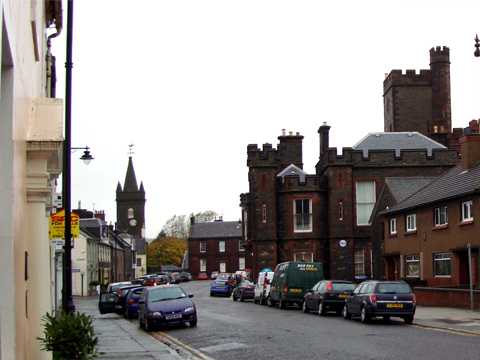 Colour view along High Street, Kirkcudbright, showing the Tolbooth and the County Building.