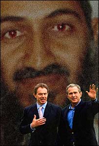 Britský premiér Tony Blair a americký prezident George Bush