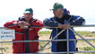 Derek and Matthew chatting over a gate