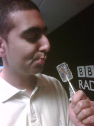Rav trying a Scorpion Lollipop