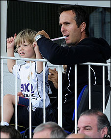 Michael Vaughan and son watching a match at Headingley