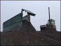 Truck dumping waste