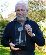 Sir Robin Knox-Johnston with his award