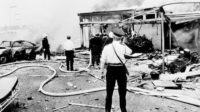 Emergency service workers at the scene of an explosion in Oxford Street bus station in the heart of Belfast during 'Bloody Friday', 21 July 1972 (Press Association)