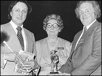 Ron presenting comedian Ken Dodd OBE with a Jester for his charity work.