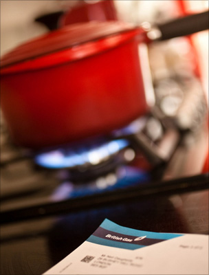 Gas bill in front of cooker
