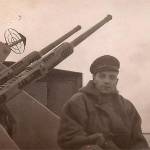 Harry Wright by twin Oerlikon gun on board HMS Kent