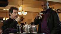 Adam (Tom Hollander, left) and Leon (Colin Salmon) share a few pints