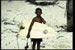 pic; small boy with surfboard.