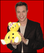Will Young with a pudsey bear 