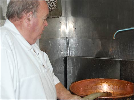 Owner Martin Mizen stirs the ingredients. 