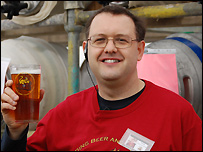 Event organiser Phillip Gill raises a glass