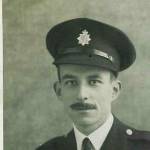 Harry Chambers in his firemans uniform complete with hat - he served in London during the war