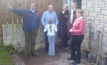 John suggests the tasks for the next visit.