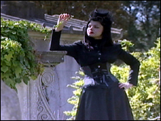 Miss Kittie Klaw in a cemetery