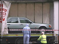 Police take away the car