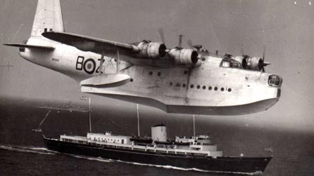 Mark V Sunderland over Royal Yacht Britannia, mid 1950s.