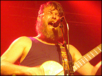 Jake Byers of Hayseed Dixie on stage in Cambridge