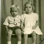 Kay with her younger brother wondering "Who is our Daddy?" during the Second World War. Photo taken 1945.