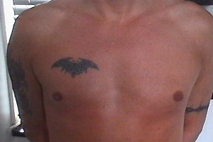 Anthony shows us his tatoos