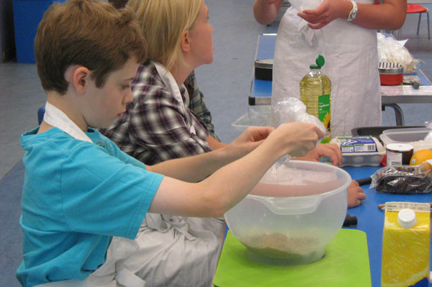 Making gooseberry crumble