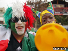Mexican and South African football supporters
