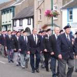 Sunday 14 August 2005: VJ 60th Anniversary Veterans’ Parade, Main Street, Egremont, Cumbria. Among those seen in the photograph: Joe Toner, Arthur Ibbotson, Frank Flynn, Roy Rogers, Billy Gribbin, Jack Farrell, Leo Smith, Joe Pooley, Jim Jolly, Ray Devlin. [Photograph by Joseph Ritson]