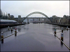 View of Tyne Bridge from Millennium Bridge with bollards in teh foreground
