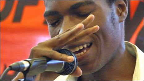 taking the microphone