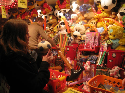 The birthday girl trying to win a prize