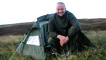 Mark Stephen beside a tent