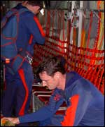 RAF Falcons preparing to jump inside the C130