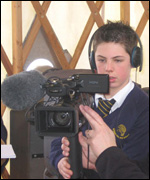 William Howard pupil filming for School Report