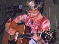 Justine plays a song
