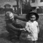 Adrienne Ames (2) models Audrey Ames’ (18) WAAF (Women’s Auxiliary Air Force) issue ‘tin hat’ on Taylors Green, East Acton, summer 1942. Adrienne saw the houses behind her destroyed in February 1944 raid. Photo: ‘Glad’ Ames.