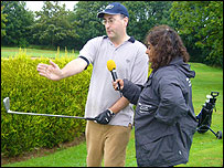 Chris Egerton teaches Rupal how to swing her club