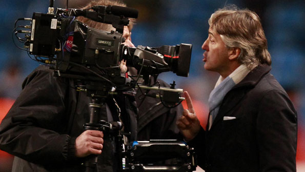 Roberto Mancini confronts a cameraman