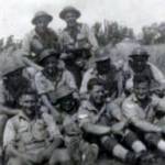 Sergeant Ronald Budd and members of the 26TH Queens Royal Regiment pausing for a break whilst pushing up through Italy towards Rome, May 1943 near Gravine